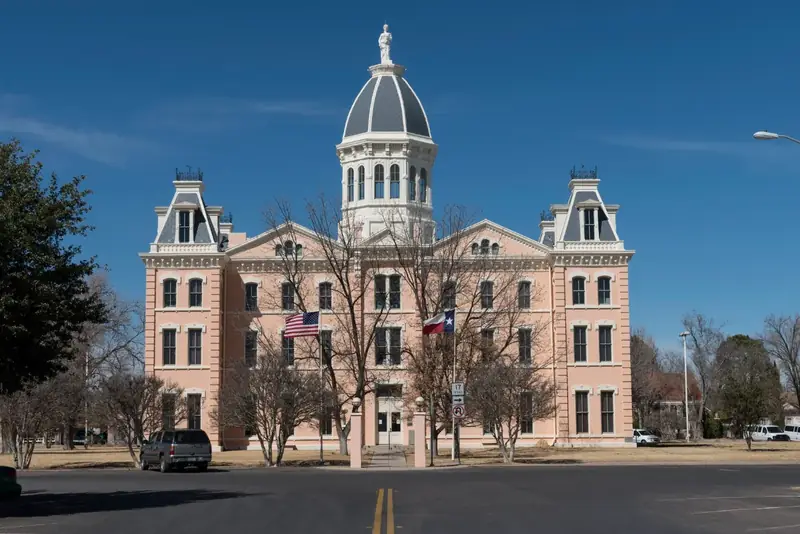 The pink Presidio County Courthouse in Marfa with its silver dome
